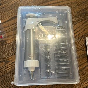 New and sealed Kuhn Rikon Stainless Steel Cookie Press set with 14 molds+6 tips